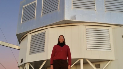 Alycia Weinberger in front of Magellan Telescope