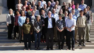 The entire group from the Origins 2015 Meeting together on the front stops of Carnegie's headquarters in Washington, D.C.