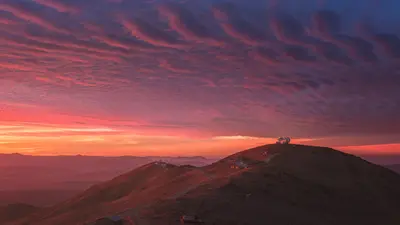 Sunset behind the Magellan telescopes