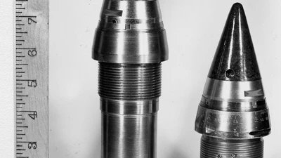 A proximity fuze at the left compared with a clockwork fuze at right