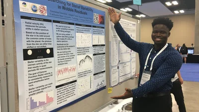 Summer student presents his work at the AAS meeting. 