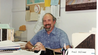 The late Paul Silver smiles from behind his desk at the Carnegie Institution for Science Broad Branch Road Campus. The Carnegie Institution for Science recently introduced a new named postdoctoral fellowship in his honor. Image courtesy of Carnegie Institution for Science.