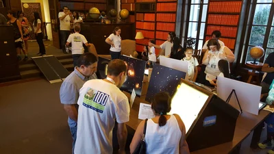 Open House attendees learn about the history of astronomy in the Observatories' library