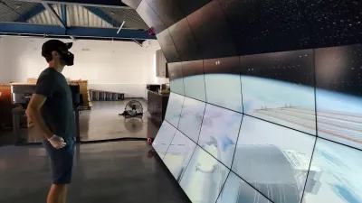 Carnegie theoretical astrophysicist Anthony Piro engages with a 3-D rendering of the International Space Station on the VizLab’s wall.