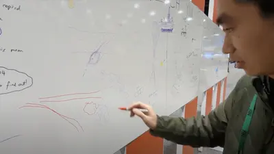 Ming Hao Draws Subduction Zone at AGU