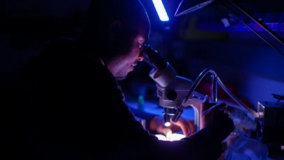 Innocent Ezenwa at Microscope