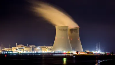 nuclear cooling towers in Belgium at night 