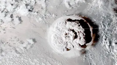 Still shot from a looping video showing an umbrella cloud generated by the underwater eruption of the Hunga Tonga-Hunga Ha’apai volcano on Jan. 15, 2022. The GOES-17 satellite captured the series of images that also show crescent-shaped shock waves and lightning strikes. Credit: NASA Earth Observatory image by Joshua Stevens using GOES imagery courtesy of NOAA and NESDIS.