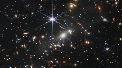 JWST Image of a foreground cluster gravitationally lensing background galaxies. Credits: NASA, ESA, CSA, and STScI