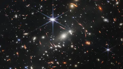 Thousands of galaxies flood this near-infrared image of galaxy cluster SMACS 0723. High-resolution imaging from NASA’s James Webb Space Telescope combined with a natural effect known as gravitational lensing made this finely detailed image possible. Credit: NASA, ESA, CSA, STScI