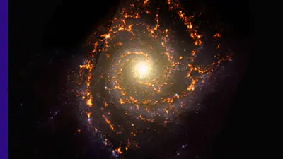 NGC0628 is shown here as an ALMA (orange) composite with Hubble Space Telescope (red) data.
