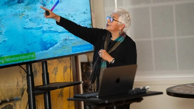 Devaki Bhaya Pointing to screen