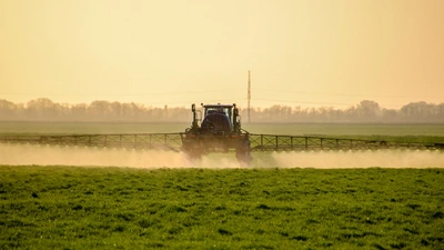 Fertilizer being sprayed on wheat fields