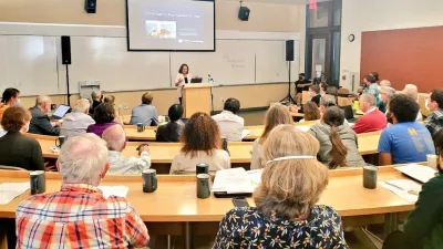 Anna Michalak addresses the retirement symposium for Joe Berry