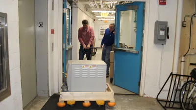 Carnegie scientists set up DTM's new mass spectrometer at Broad Branch Road