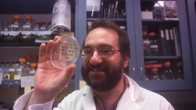 Arthur Grossman with a petri dish