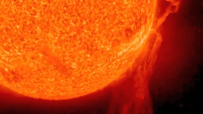 A very long solar filament that had been snaking around the Sun erupted (Dec. 6, 2010) with a flourish. Credit: NASA/GSFC/SOHO  