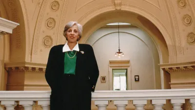 Maxine Singer with the rotunda of the Carnegie Institution administration building