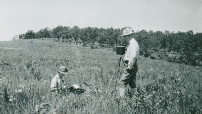 Frederic Clements working in the field with his wife Edith taking dictation