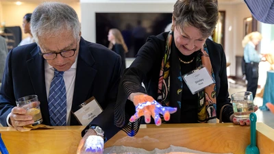 Explore the world through hands on stations like the topography sandbox.