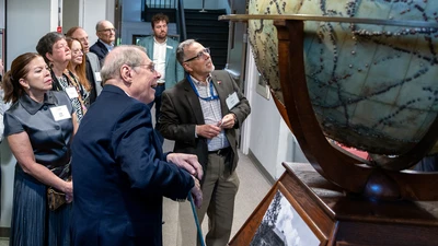 Librarian Emeritus Shaun Hardy gives a history tour at the Earth & Planets Laboratory