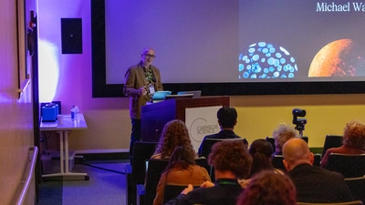 Earth and Planets Laboratory Director gives remarks at the first day of Workshop on Information, Selection, and Evolution (WISE).