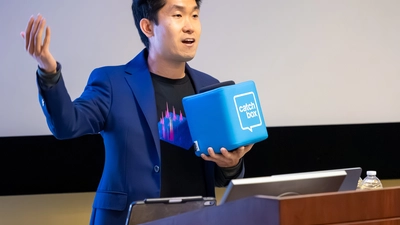 Mike Wong moderates Q&A at Neighborhood Lecture featuring NASA’s Caleb Scharf. In 2025, Wong and Scharf received a $5 million, five-year grant to develop A.I. tools for enhancing the search for signs of life on other planets.