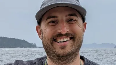 Britt Abrahamson wears a hat on the water