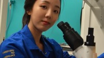 Jiwoon at a microscope. 