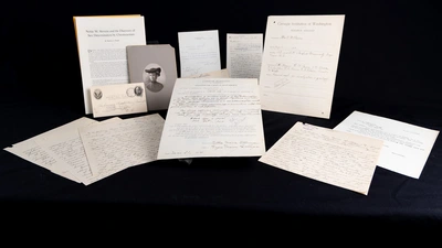Nettie Stevens' grant and accompanying papers including recommendations, scientific report, research assistant application, application approval letter, a postcard from Bryn Mawr, and a retrospective look back on the impact of her work. 