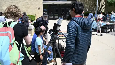 Kids talk to a NASA scientist at Rockville Science Day