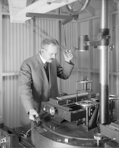 George Ellery Hale at the spectrograph of the 60-foot solar tower telescope, Mount Wilson Observatory.
