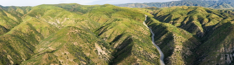 A road winds through the San Gabriel Mountain