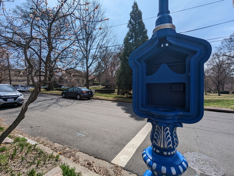 And empty call box on the street near EPL