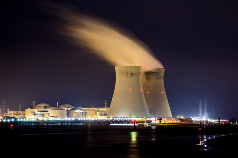 nuclear cooling towers in Belgium at night 