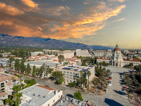 Downtown Pasadena aerial view with golden sky lit up by setting sun