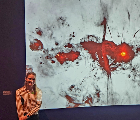 Allison Matthews with the image from the MeerKAT radio telescope. 