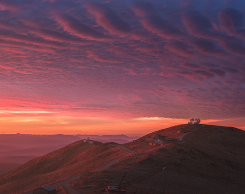 Sunset behind the Magellan telescopes