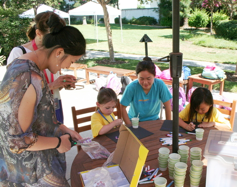 Summer students lead STEM activity. 