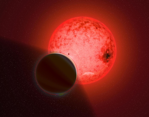 Artist's conception of a large gas giant planet orbiting a small red dwarf star called TOI-5205. Image by Katherine Cain, courtesy of the Carnegie Institution for Science. 