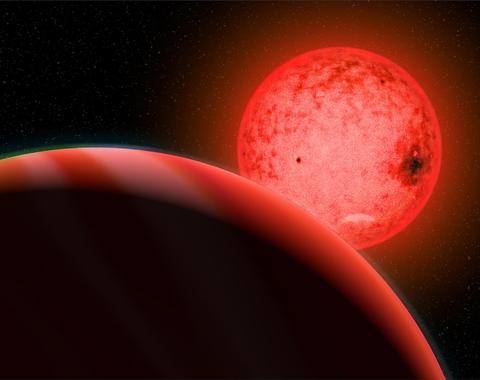 Artist's conception of a a large gas giant planet orbiting a small red dwarf star called TOI-5205. Image by Katherine Cain, courtesy of the Carnegie Institution for Science. 