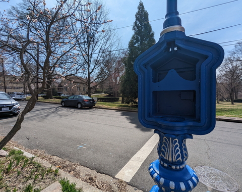 And empty call box on the street near EPL