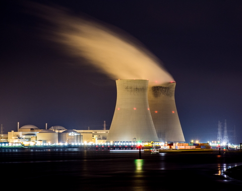 nuclear cooling towers in Belgium at night 