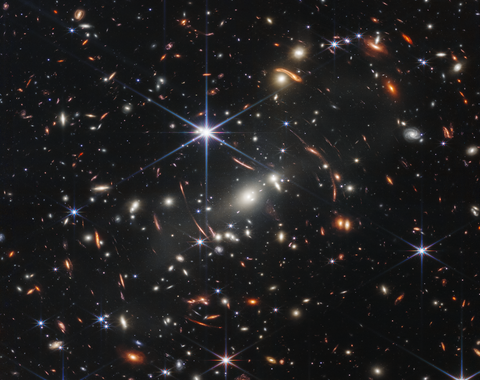Thousands of galaxies flood this near-infrared image of galaxy cluster SMACS 0723. High-resolution imaging from NASA’s James Webb Space Telescope combined with a natural effect known as gravitational lensing made this finely detailed image possible. Credit: NASA, ESA, CSA, STScI