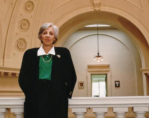 Maxine Singer with the rotunda of the Carnegie Institution administration building