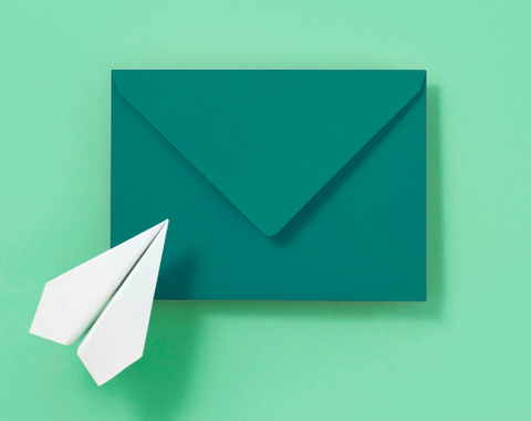 A letter with a paper airplane
