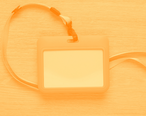 Orange tile with blank name tag