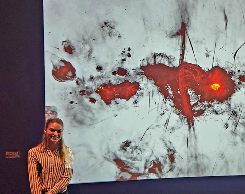 Allison Matthews with the image from the MeerKAT radio telescope. 