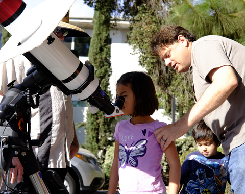 Looking through the telescope at the annual Carnegie Science Observatories Open House.