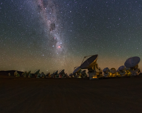 The Milky Way glitters above the ALMA array in this image taken from a time lapse sequence during the ESO Ultra HD Expedition.  Credit: ESO/B. Tafreshi (twanight.org)